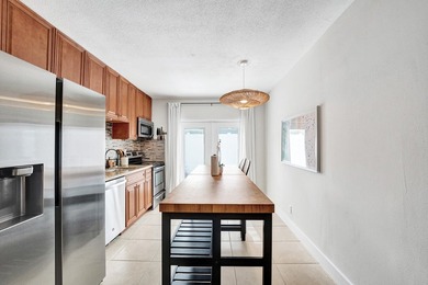 RARELY AVAILABLE sophisticated 1st floor residence in the highly - photo 7