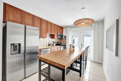 RARELY AVAILABLE sophisticated 1st floor residence in the highly - photo 8