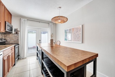 RARELY AVAILABLE sophisticated 1st floor residence in the highly - photo 9