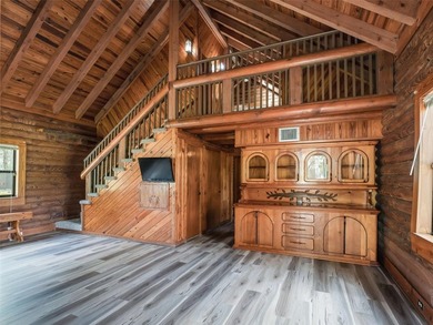 Tucked away behind a beautiful board-fenced entrance and paved - photo 12