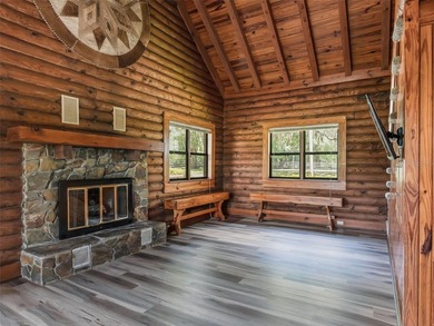 Tucked away behind a beautiful board-fenced entrance and paved - photo 13
