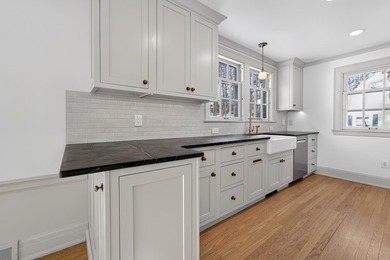 Set on a mature lot in sought-after Shorewood Hills, this - photo 13