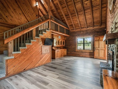 Tucked away behind a beautiful board-fenced entrance and paved - photo 14