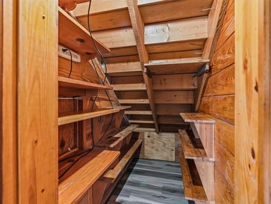 Tucked away behind a beautiful board-fenced entrance and paved - photo 18