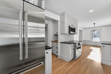Set on a mature lot in sought-after Shorewood Hills, this - photo 18