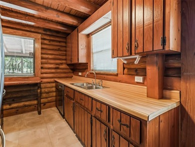 Tucked away behind a beautiful board-fenced entrance and paved - photo 19