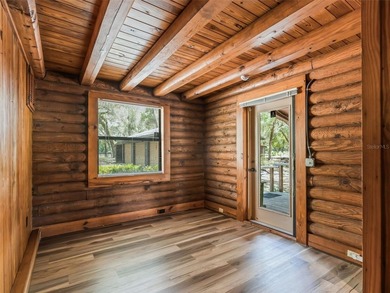 Tucked away behind a beautiful board-fenced entrance and paved - photo 24