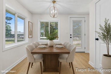 Enjoy views of Bostwick Lake from this completely updated home - photo 5