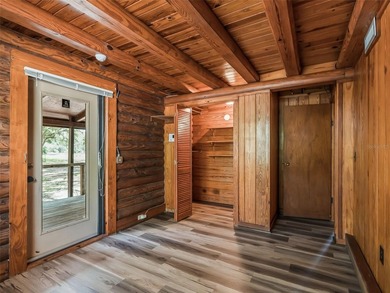 Tucked away behind a beautiful board-fenced entrance and paved - photo 25