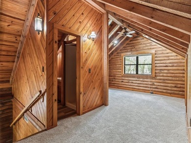 Tucked away behind a beautiful board-fenced entrance and paved - photo 26