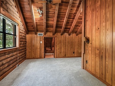 Tucked away behind a beautiful board-fenced entrance and paved - photo 28