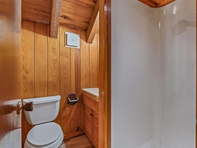 Tucked away behind a beautiful board-fenced entrance and paved - photo 30