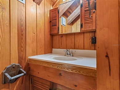 Tucked away behind a beautiful board-fenced entrance and paved - photo 31