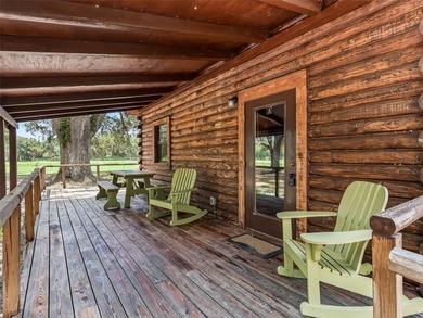 Tucked away behind a beautiful board-fenced entrance and paved - photo 32