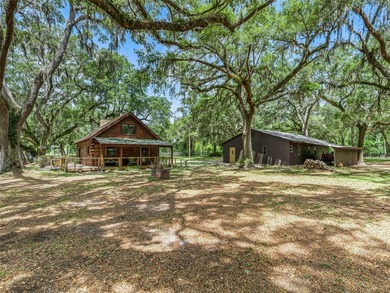 Tucked away behind a beautiful board-fenced entrance and paved - photo 38