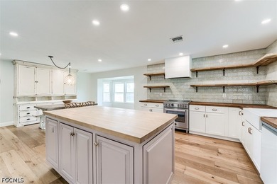 Beautifully renovated 3-bedroom, 2-bath pool home offering a - photo 6