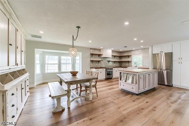 Beautifully renovated 3-bedroom, 2-bath pool home offering a - photo 10
