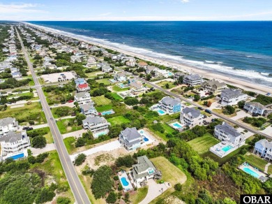 Welcome to 913 Whalehead Drive, a beautifully maintained