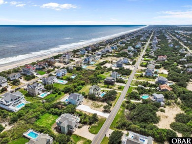 Welcome to 913 Whalehead Drive, a beautifully maintained