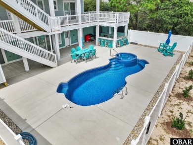 Welcome to 913 Whalehead Drive, a beautifully maintained