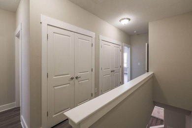 This Savannah floor plan features 3 bedrooms, 2.5 baths, and a - photo 12