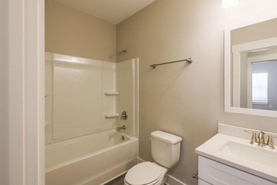 This Savannah floor plan features 3 bedrooms, 2.5 baths, and a - photo 13