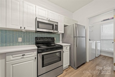 Don't miss this beautifully appointed end-unit condo with