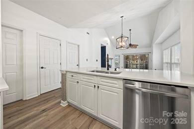 Don't miss this beautifully appointed end-unit condo with