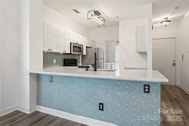 Don't miss this beautifully appointed end-unit condo with