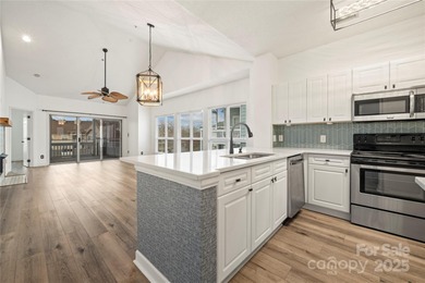 Don't miss this beautifully appointed end-unit condo with