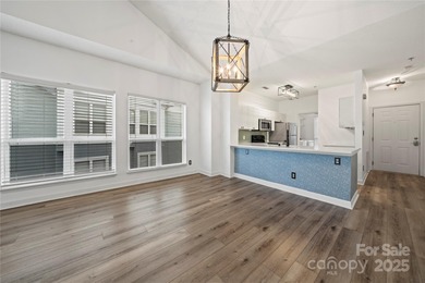 Don't miss this beautifully appointed end-unit condo with