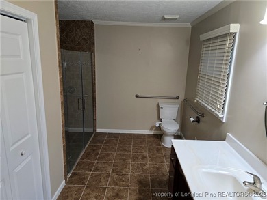 Take a look at this stunning all brick home designed with full