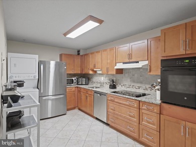 **HUGE PRICE IMPROVEMENT**Carefree living just minutes from DC