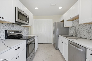 Welcome to this beautifully remodeled first-floor condo located - photo 4