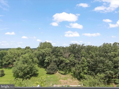 **HUGE PRICE IMPROVEMENT**Carefree living just minutes from DC