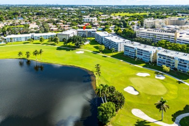 Lake Condo For Sale in Atlantis, Florida