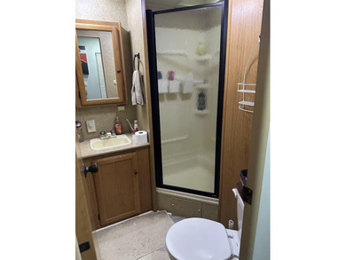 Charming 2010 Nomad camper with large deck on leased land with - photo 12