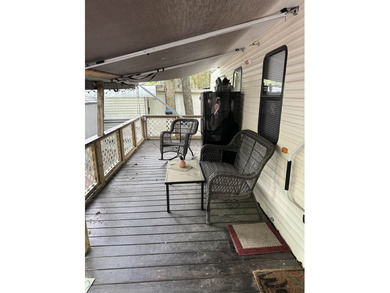 Charming 2010 Nomad camper with large deck on leased land with - photo 16
