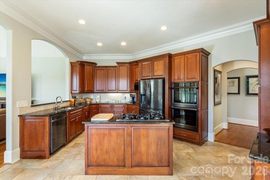 This stunning home overlooks the 17th green at Cleghorn Golf - photo 17