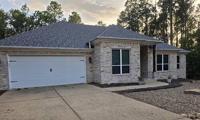 Strategically positioned for privacy, this beautiful home on the - photo 1