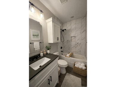 Strategically positioned for privacy, this beautiful home on the - photo 8