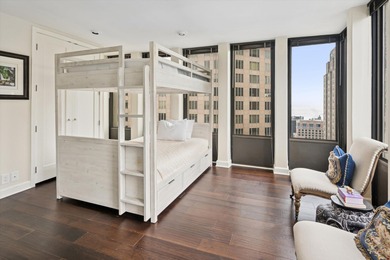 A rare opportunity to own a truly distinctive corner duplex