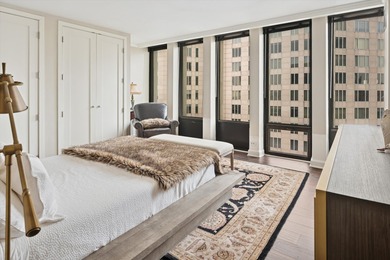 A rare opportunity to own a truly distinctive corner duplex