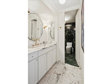 A rare opportunity to own a truly distinctive corner duplex