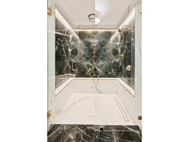 A rare opportunity to own a truly distinctive corner duplex