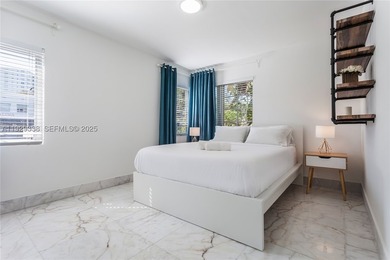 a 20-unit hospitality asset located along one of Miami Beach's - photo 7