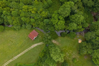 Own approximately 10 unrestricted acres with over 900 feet of - photo 31