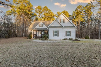 FULLY FURNISHED KERR LAKE WATERFRONT home located on acre lot on  - Lake Other SOLD! in Henderson, North Carolina