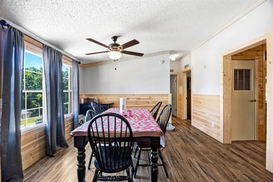 Lake view home on Nolin Lake featuring a boat slip and plenty of - photo 12