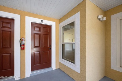 Bright and move-in ready second-floor condo in desirable Woods - photo 1
